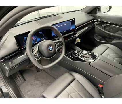 2024 BMW 5 Series i xDrive is a Black 2024 BMW 5-Series Sedan in Erie PA
