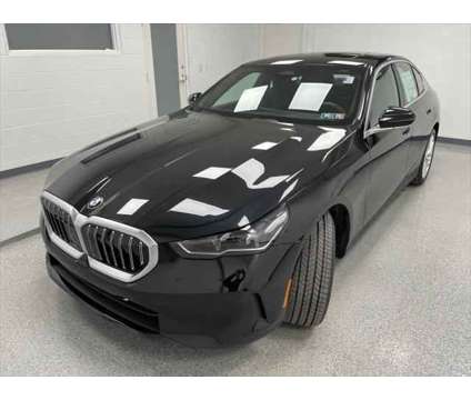 2024 BMW 5 Series i xDrive is a Black 2024 BMW 5-Series Sedan in Erie PA