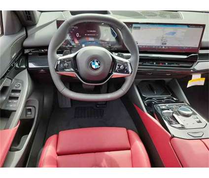 2024 BMW 5 Series i xDrive is a White 2024 BMW 5-Series Sedan in Milford DE