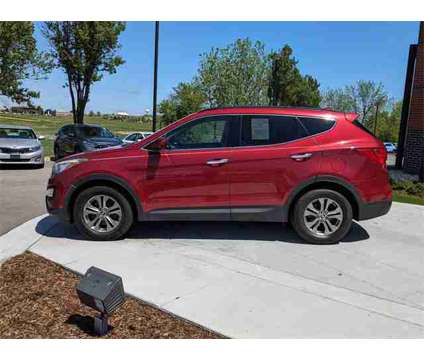 2014 Hyundai Santa Fe Sport 2.4L is a Red 2014 Hyundai Santa Fe Sport 2.4L SUV in Algonquin IL