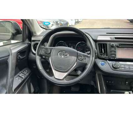 2016 Toyota RAV4 Hybrid XLE is a Grey 2016 Toyota RAV4 Hybrid XLE Hybrid in Stamford CT