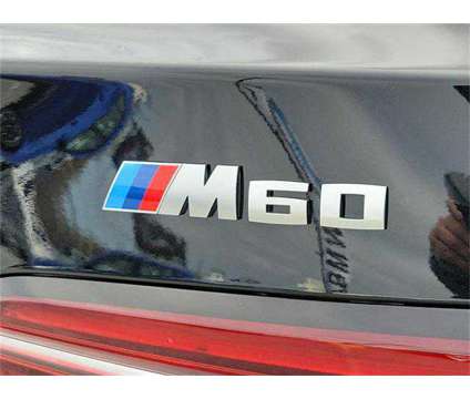 2024 BMW i5 M60 is a Black 2024 Sedan in Milford DE