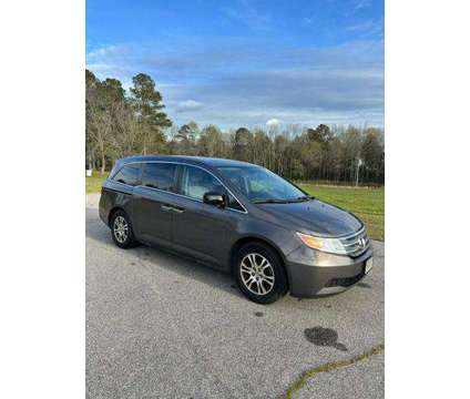 2013 Honda Odyssey for sale is a Grey 2013 Honda Odyssey Car for Sale in Coats NC