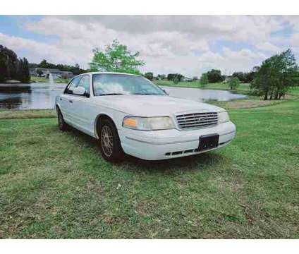 2002 Ford Crown Victoria for sale is a White 2002 Ford Crown Victoria 4dr Car for Sale in Haines City FL