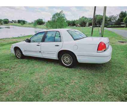 2002 Ford Crown Victoria for sale is a White 2002 Ford Crown Victoria 4dr Car for Sale in Haines City FL