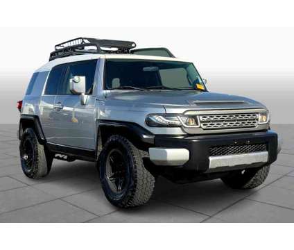 2007UsedToyotaUsedFJ CruiserUsed2WD 4dr Auto is a Silver, White 2007 Toyota FJ Cruiser Car for Sale in Rockwall TX