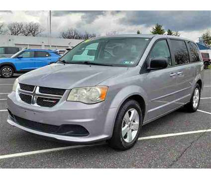 2014 Dodge Grand Caravan SE is a Silver 2014 Dodge grand caravan SE Car for Sale in Sellersville PA