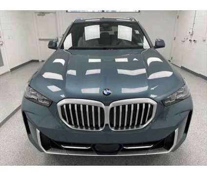 2024 BMW X5 xDrive40i is a Blue 2024 BMW X5 4.8is SUV in Erie PA