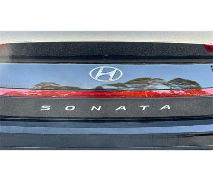 2023 Hyundai Sonata SEL is a Black 2023 Hyundai Sonata Sedan in Vero Beach FL