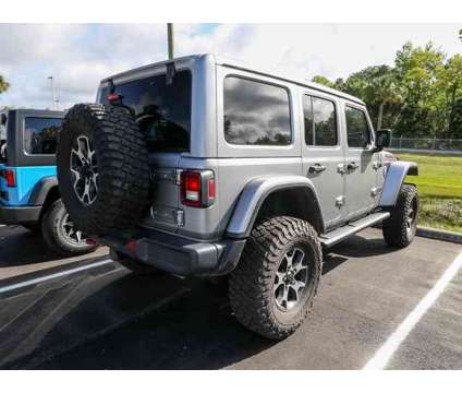 2021 Jeep Wrangler Unlimited Rubicon is a Silver 2021 Jeep Wrangler Unlimited Car for Sale in Homosassa FL