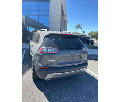 2021 Jeep Cherokee Limited is a Grey 2021 Jeep Cherokee Limited Car for Sale in Orlando FL