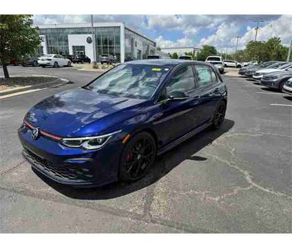 2024 Volkswagen Golf GTI SE is a Black, Blue 2024 Volkswagen Golf GTI Hatchback in Lees Summit MO