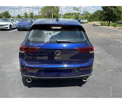 2024 Volkswagen Golf GTI SE is a Black, Blue 2024 Volkswagen Golf GTI Hatchback in Lees Summit MO
