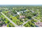 8280 Woodsmuir Dr, Palm Beach Gardens, FL 33412