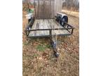 5 x 10 foot utility trailer with spare $1200 or best