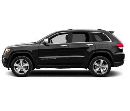 2015 Jeep Grand Cherokee Limited is a Tan 2015 Jeep grand cherokee Limited Car for Sale in Moline IL