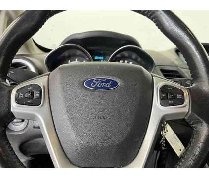2016 Ford Fiesta SE is a White 2016 Ford Fiesta SE Sedan in Logan UT