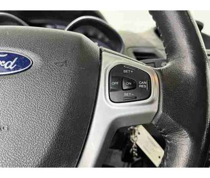 2016 Ford Fiesta SE is a White 2016 Ford Fiesta SE Sedan in Logan UT