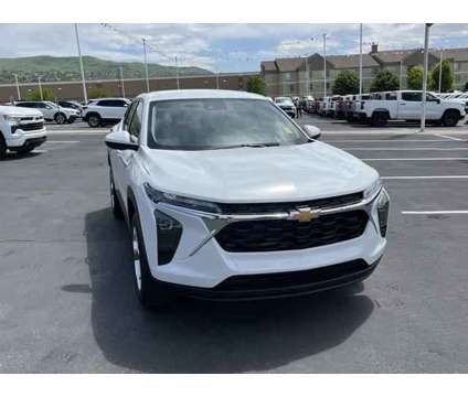 2024 Chevrolet Trax FWD SP is a White 2024 Chevrolet Trax Station Wagon in Woods Cross UT