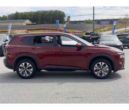 2023 Nissan Rogue SV FWD is a Red 2023 Nissan Rogue SV SUV in Anderson SC