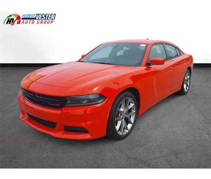 2022 Dodge Charger SXT is a Red 2022 Dodge Charger SXT Sedan in Wilson NC