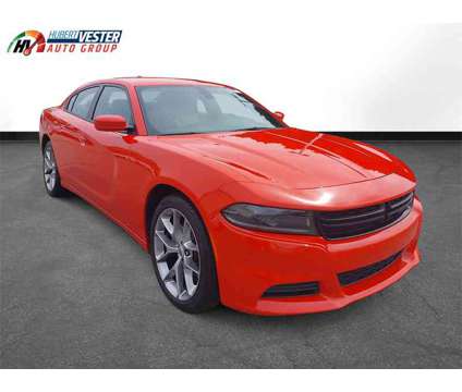 2022 Dodge Charger SXT is a Red 2022 Dodge Charger SXT Sedan in Wilson NC