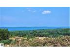 Alden, Torch Lake Views from this 2.5 acre parcel less than