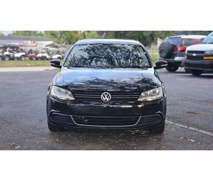 2014 Volkswagen Jetta for sale is a Black 2014 Volkswagen Jetta 2.5 Trim Car for Sale in Saint Cloud FL