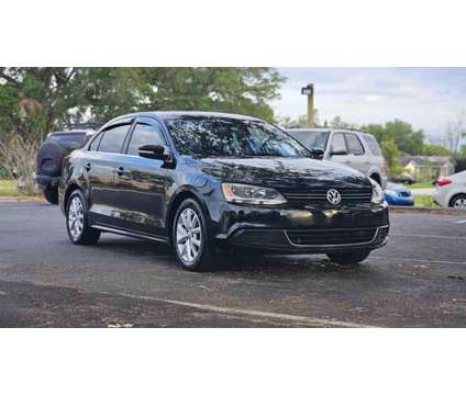 2014 Volkswagen Jetta for sale is a Black 2014 Volkswagen Jetta 2.5 Trim Car for Sale in Saint Cloud FL