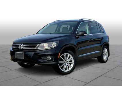 2013UsedVolkswagenUsedTiguanUsed4WD 4dr Auto is a Black 2013 Volkswagen Tiguan Car for Sale in Westwood MA