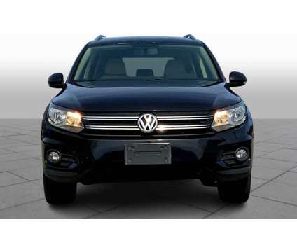 2013UsedVolkswagenUsedTiguanUsed4WD 4dr Auto is a Black 2013 Volkswagen Tiguan Car for Sale in Westwood MA