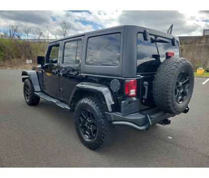 2016 Jeep Wrangler Unlimited Backcountry is a Black 2016 Jeep Wrangler Unlimited Car for Sale in Trevose PA
