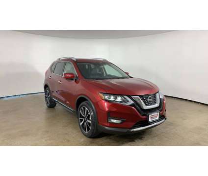 2020 Nissan Rogue SL is a Red 2020 Nissan Rogue SL Car for Sale in Peoria IL
