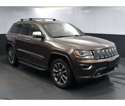 2017 Jeep Grand Cherokee Overland is a Brown 2017 Jeep grand cherokee Overland Car for Sale in Greenville SC