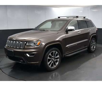2017 Jeep Grand Cherokee Overland is a Brown 2017 Jeep grand cherokee Overland Car for Sale in Greenville SC