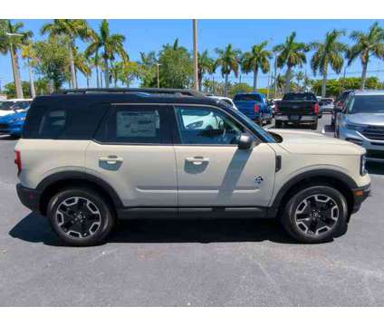 2024 Ford Bronco Sport Outer Banks is a Tan 2024 Ford Bronco Car for Sale in Estero FL