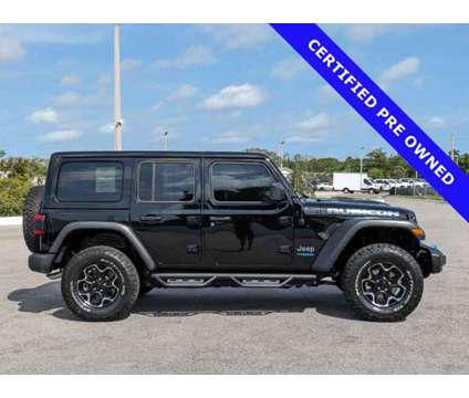 2022 Jeep Wrangler Unlimited Rubicon 4xe is a Black 2022 Jeep Wrangler Unlimited Car for Sale in Sarasota FL