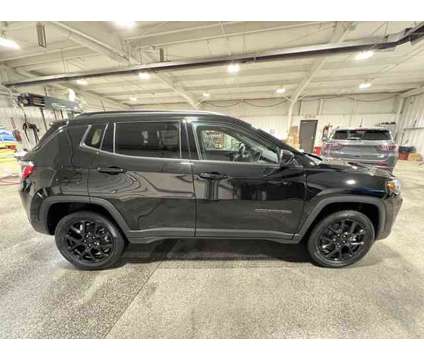 2024 Jeep Compass Latitude is a Black 2024 Jeep Compass Latitude SUV in Freeport IL