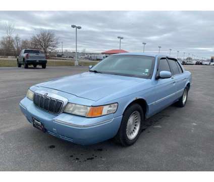 2000 Mercury Grand Marquis LS is a Blue 2000 Mercury Grand Marquis LS Sedan in Council Bluffs IA