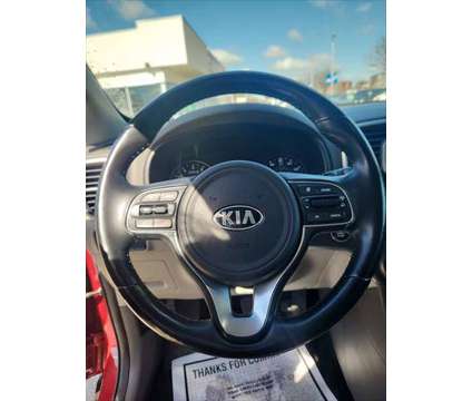 2017 Kia Sportage EX is a Red 2017 Kia Sportage EX SUV in Dubuque IA