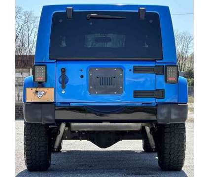 2014 Jeep Wrangler Unlimited POLAR EDITION is a Blue 2014 Jeep Wrangler Unlimited SUV in Carmel IN