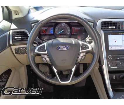 2017 Ford Fusion SE is a Silver, White 2017 Ford Fusion SE Sedan in Plattsburgh NY
