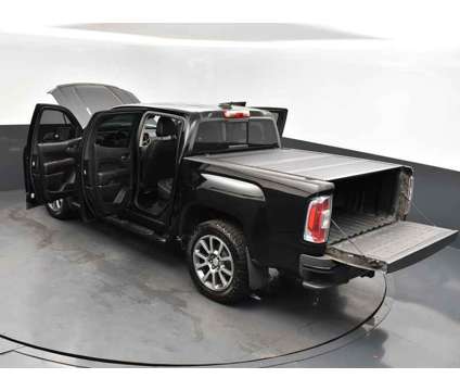 2019 GMC Canyon Denali is a Black 2019 GMC Canyon Denali Truck in Jackson MS