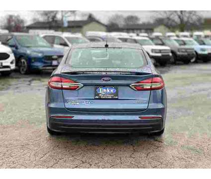 2019 Ford Fusion Energi Titanium is a Blue 2019 Ford Fusion Energi Titanium Sedan in Manteno IL