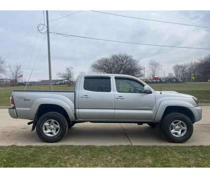 2011 Toyota Tacoma Double Cab for sale is a Silver 2011 Toyota Tacoma Double Cab Car for Sale in Grand Rapids MI