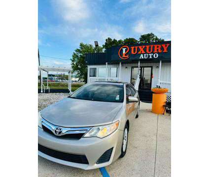 2014 Toyota Camry for sale is a Tan 2014 Toyota Camry Car for Sale in Baton Rouge LA