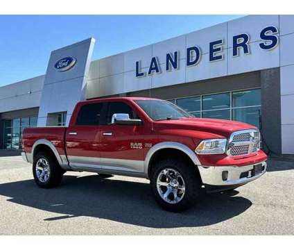 2016 Ram 1500 Laramie is a Red 2016 RAM 1500 Model Laramie Car for Sale in Southaven MS
