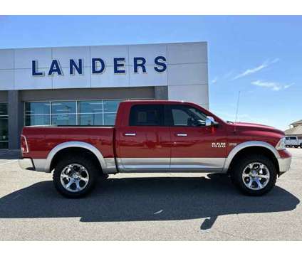 2016 Ram 1500 Laramie is a Red 2016 RAM 1500 Model Laramie Car for Sale in Southaven MS