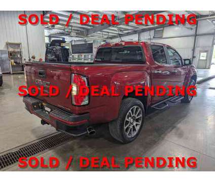 2021 GMC Canyon 4WD Denali Nav Running Boards Tonneau Cover is a Red 2021 GMC Canyon Car for Sale in Butler PA
