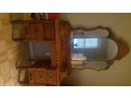 Beautiful antique vanity with 3 part mirror and 4 drawers.